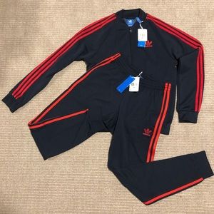 Classic adidas track suit (black with red stripes)